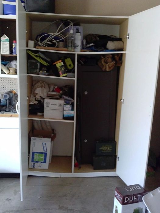 CLUTTER AREA IN GARAGE REMOVED AND REPLACED WITH CONVENIENT 'Grab and Go'