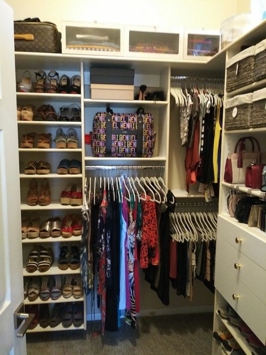 Her walk-in closet — organized right after the build